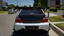 Load image into Gallery viewer, Subaru Impreza WRX/ STI Carbon Fiber License Plate Frame 2004-2007                      Subaru Impreza WRX/ STI Carbon Fiber License Plate Frame 2004-2007