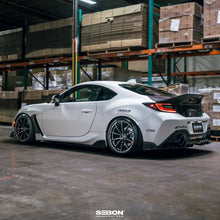 Load image into Gallery viewer, Seibon 22-24 Toyota GR86 / Subaru BRZ 2-Door Coupe Carbon Fiber Fender Trim - Gloss Finish