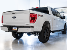 Load image into Gallery viewer, AWE Tuning 0FG 21+ Ford F150 Dual Side Exit Cat-Back Exhaust- 4.5in Chrome Silver Tips